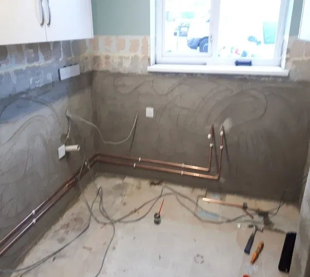 progress of work done to damp wall