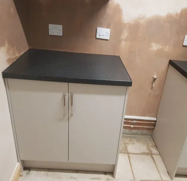progress of work done to damp wall