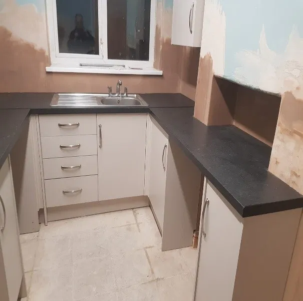 progress of work done to damp wall
