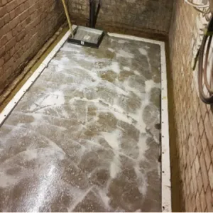 slab floor being treated